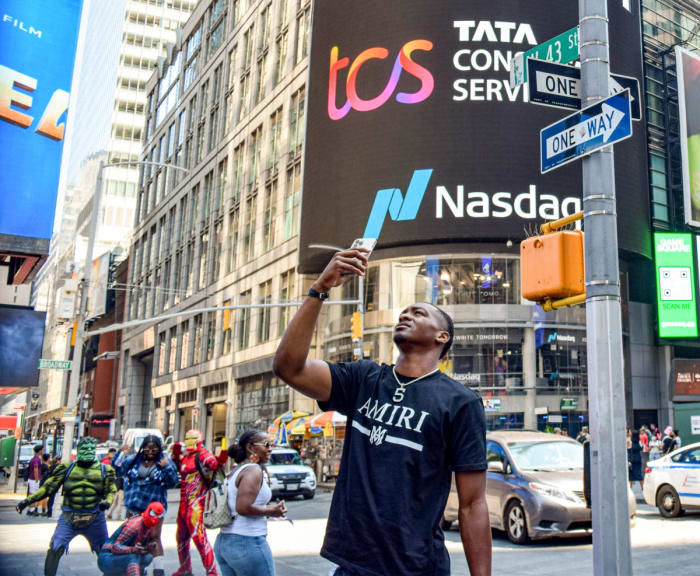 Hendon Hooker looks around Times Square